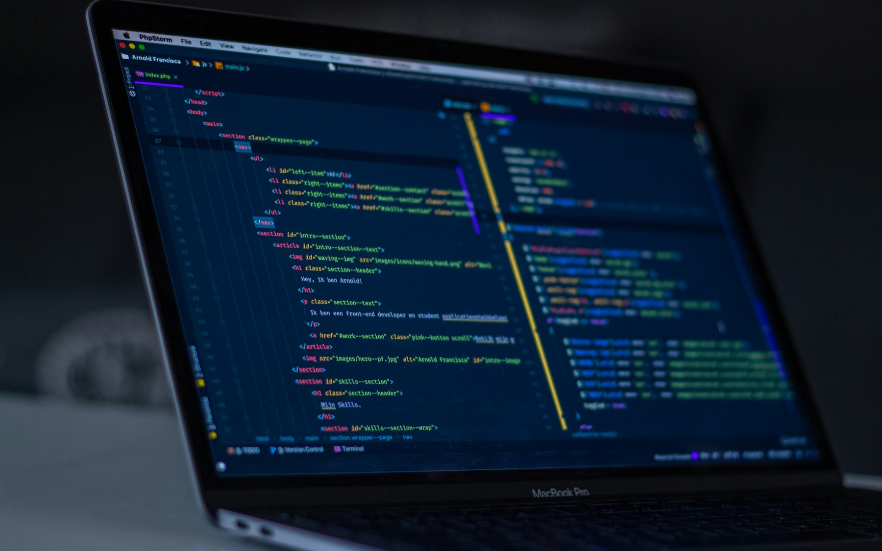 Source code visible on a laptop screen during development
