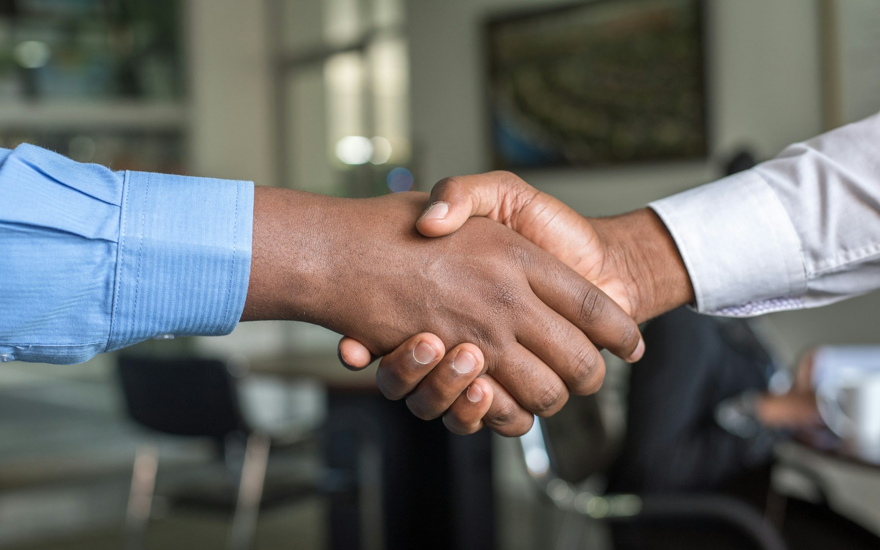 Business partners marking the beginning of a working relationship